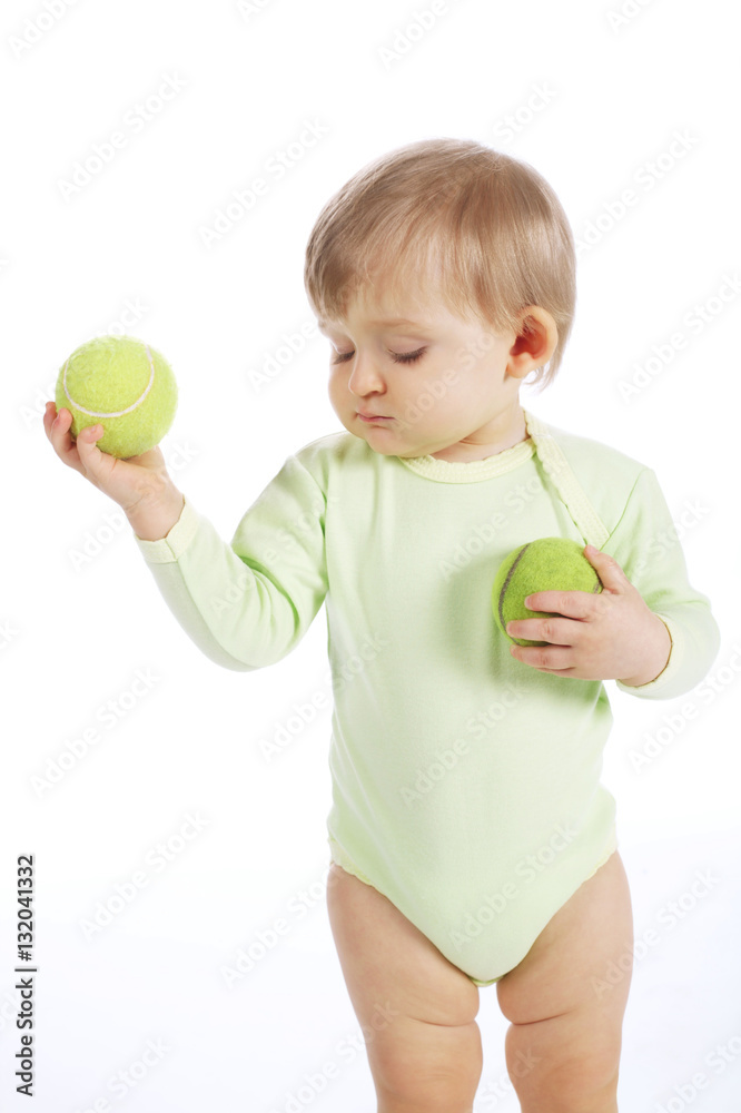 cute little girl with tennis balls cute little girl with tennis balls
