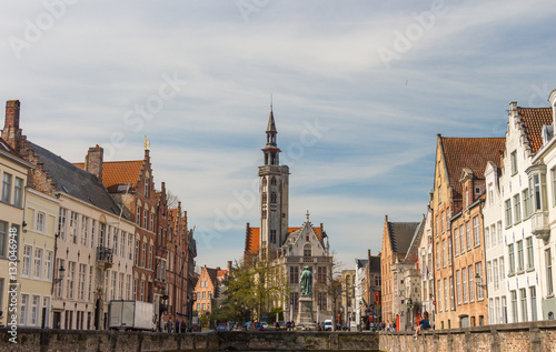 BRUGGE, Belgium - APRIL 11, 2016: Cityscape with canal Spiegelrei and Jan Van Eyck Square in the morning in Bruges, Belgium