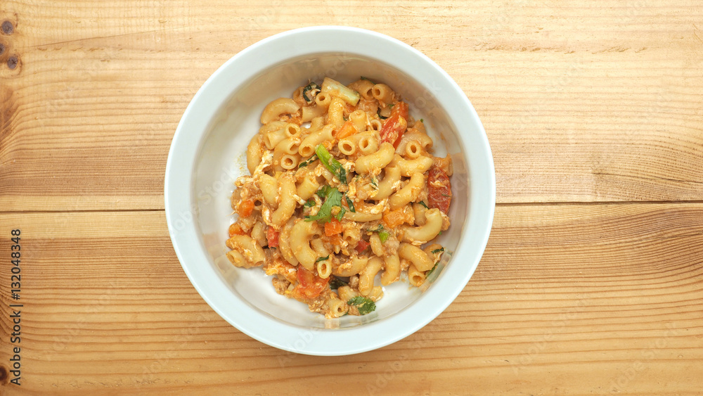 Macaroni fried with pork, tomato sauce top view Macaroni fried with pork, tomato sauce top view