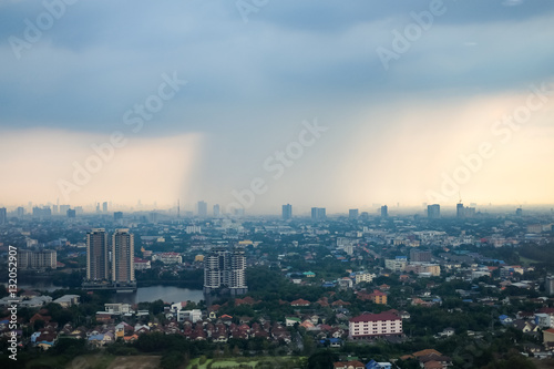 Heavy rain falling In the city from the view point on building