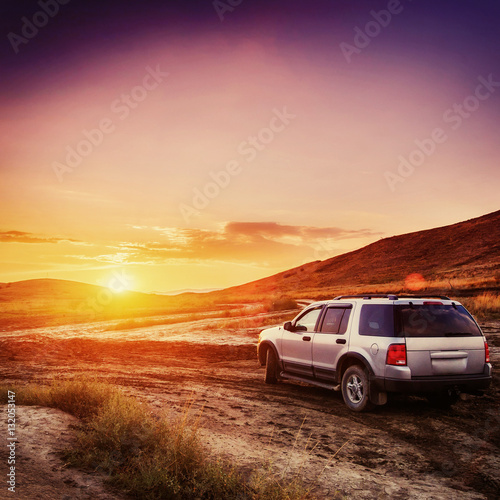 car at sunset © standret