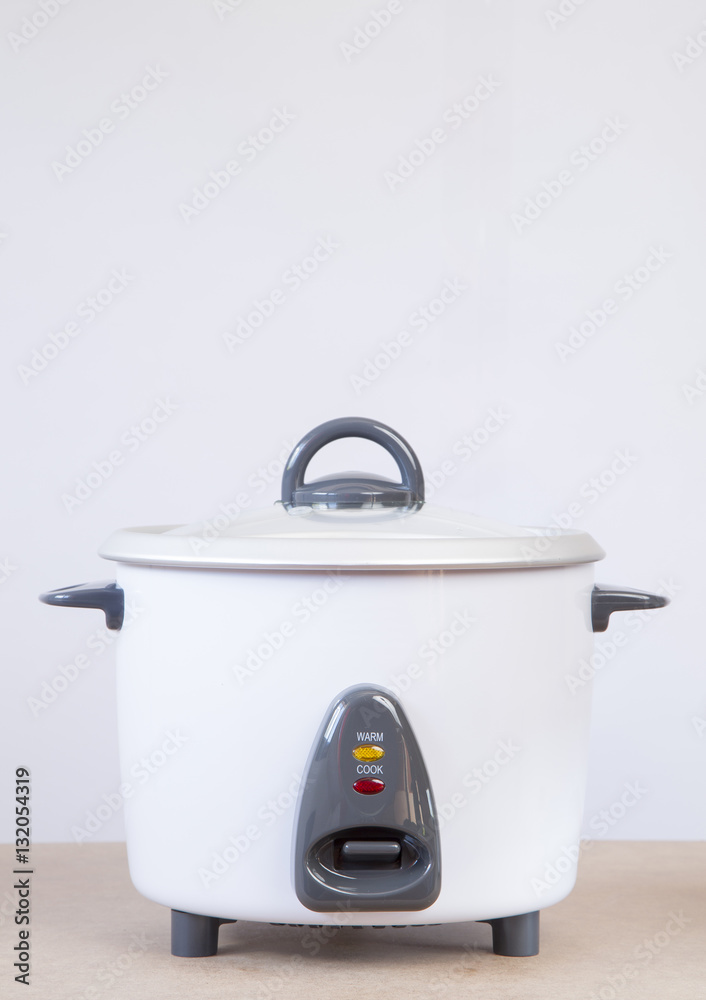 Electric rice cooker on white background Electric rice cooker on white background