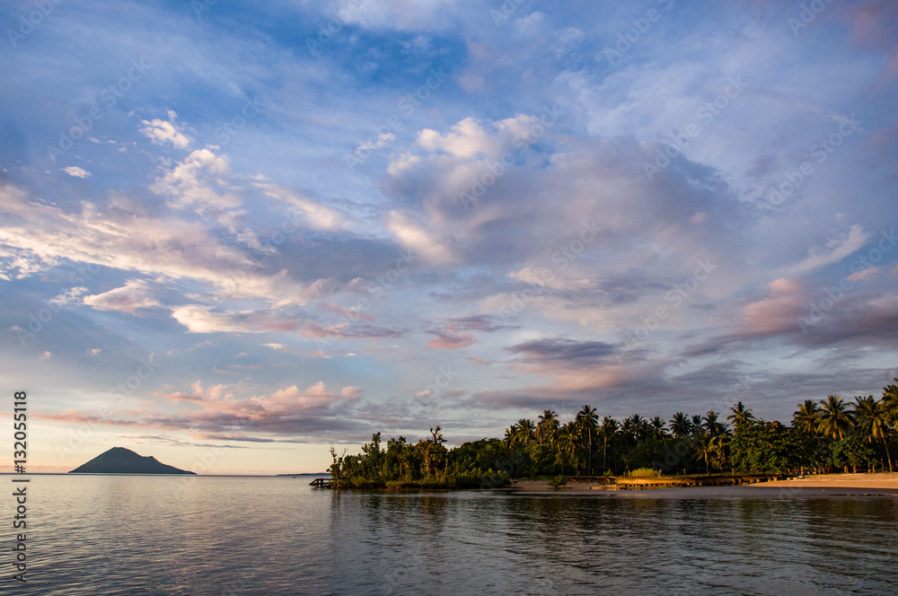 A volcano on the skyline in Bunaken National Marine Park, North Sulawesi, Indonesia