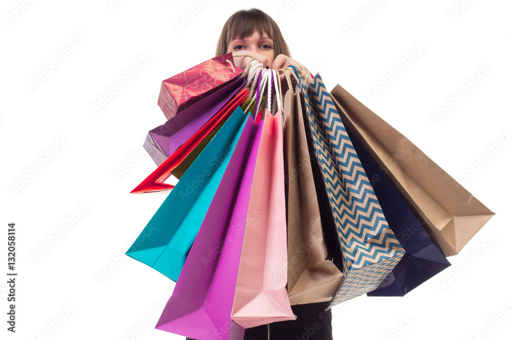 Shopping purchases, many colourful paper bags, packages in femal