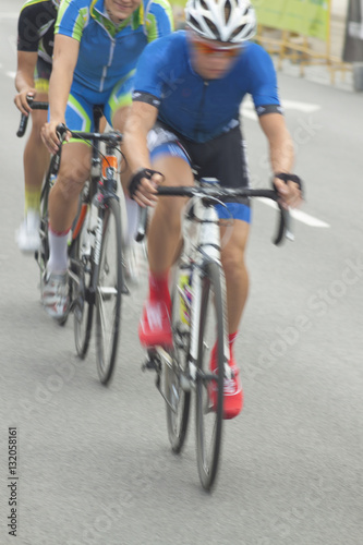 Fototapeta Naklejka Na Ścianę i Meble -  Racing Cyclists, Motion Blur