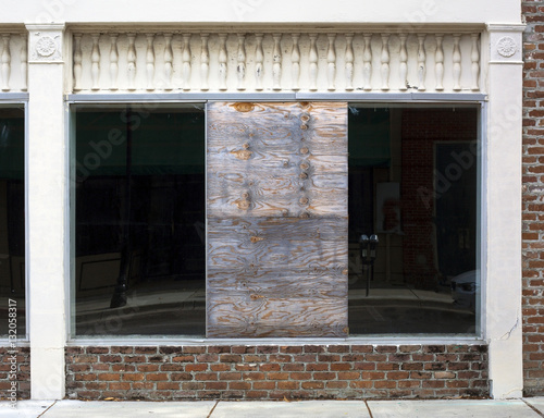 Plywood solution to broken window. © Noel