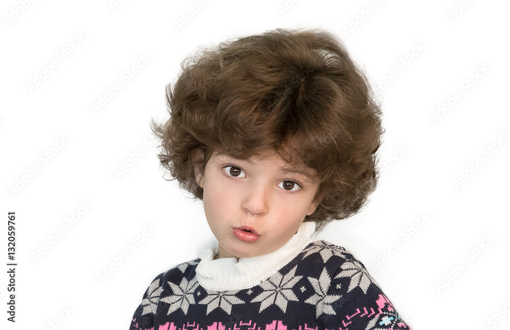 Surprised cute boy talking and looking at the camera. White background. Surprised cute boy talking and looking at the camera. White background.