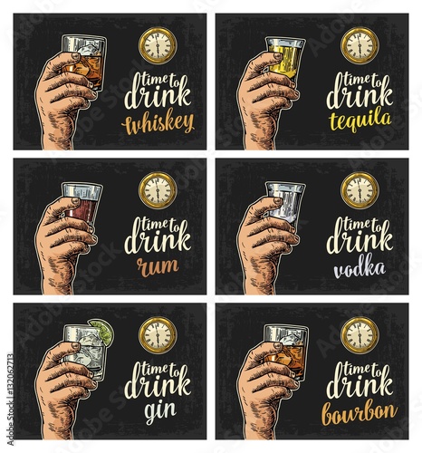 Male hand holding a glasses with drink and antique pocket watch.