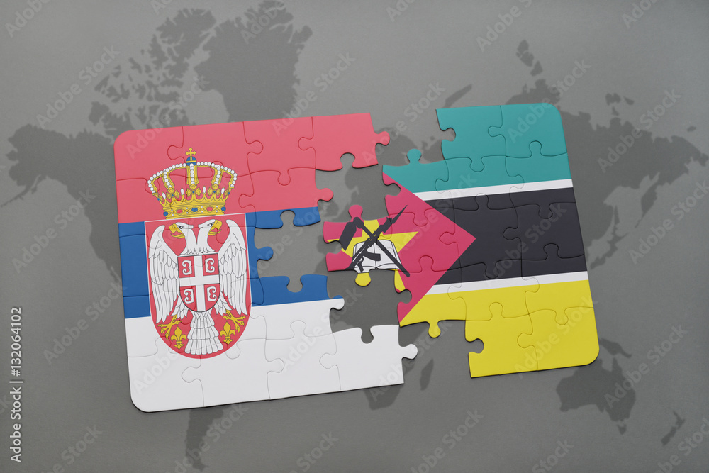 puzzle with the national flag of serbia and mozambique on a world map