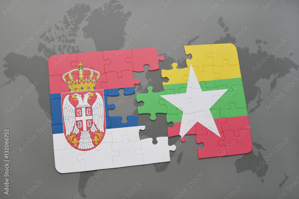 puzzle with the national flag of serbia and myanmar on a world map