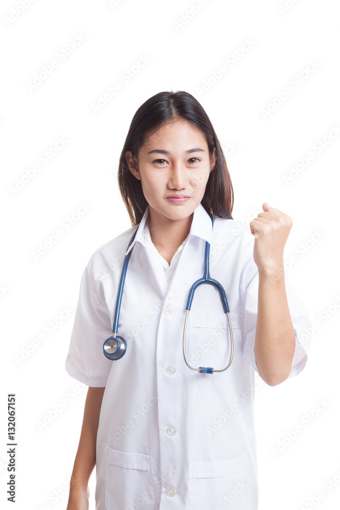 Portrait of confidence Asian young female doctor hold fist. Portrait of confidence Asian young female doctor hold fist.