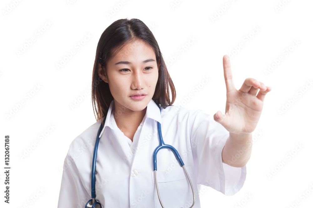 Young Asian female doctor touch a screen. Young Asian female doctor touch a screen.