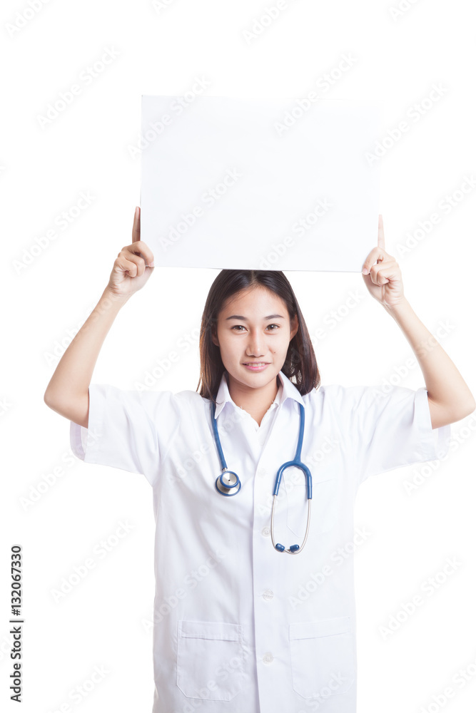 Young Asian female doctor show a blank sign over head. Young Asian female doctor show a blank sign over head.