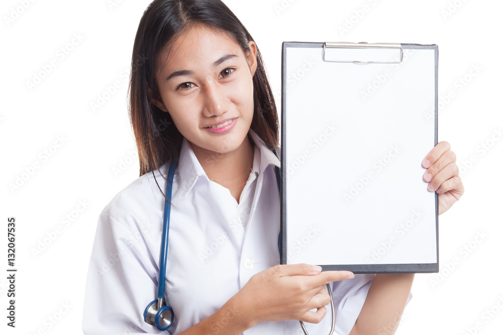 Young Asian female doctor show a blank clipboard. Young Asian female doctor show a blank clipboard.