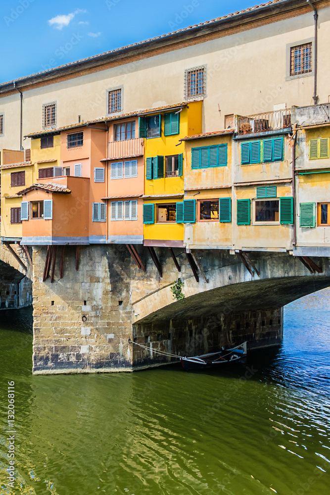 Bridge Ponte Vecchio (1345) on Arno River in Florence, Italy.