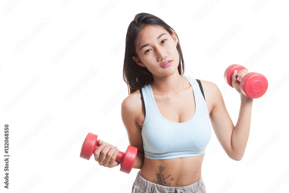 Tired Asian healthy girl exercise with dumbbell. Tired Asian healthy girl exercise with dumbbell.