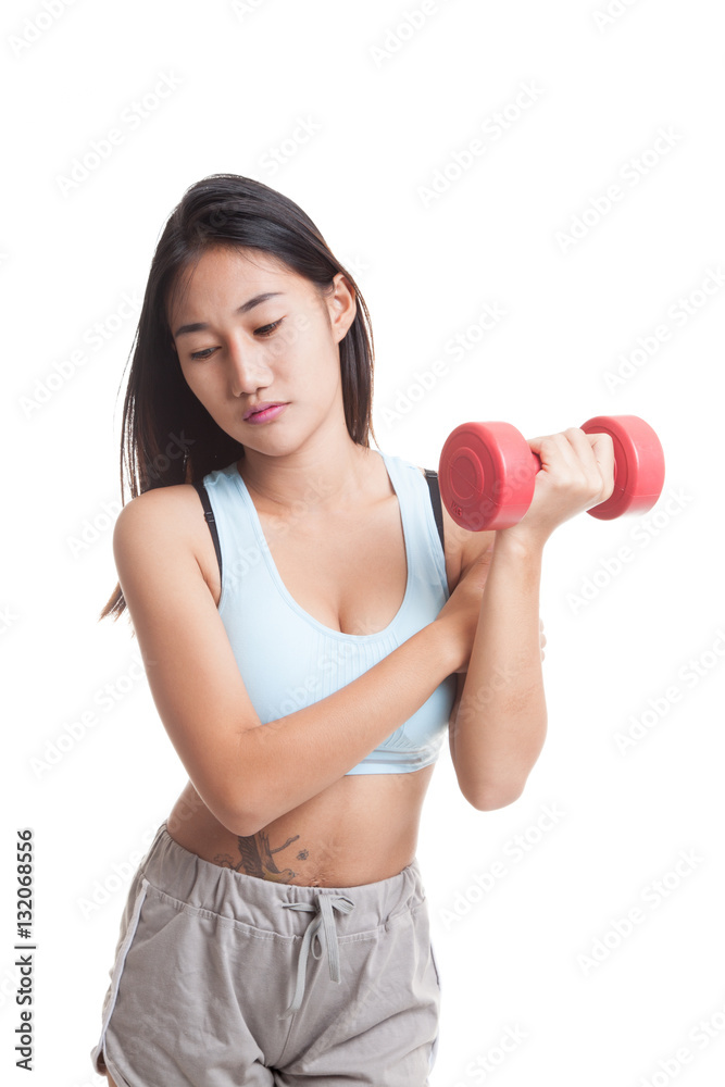 Asian healthy girl got arm pain with dumbbell. Asian healthy girl got arm pain with dumbbell.