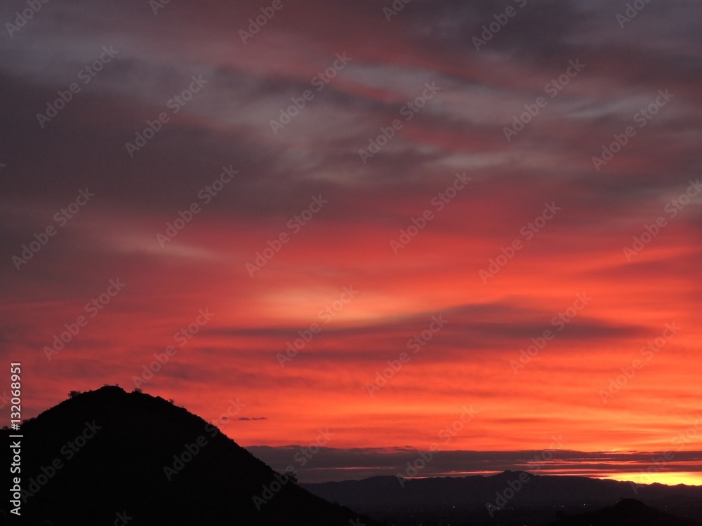 Fire looking sunset on mountains