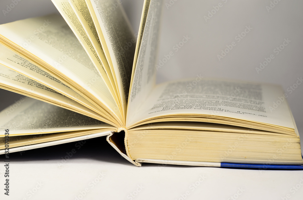 Obraz premium An open book isolated on white