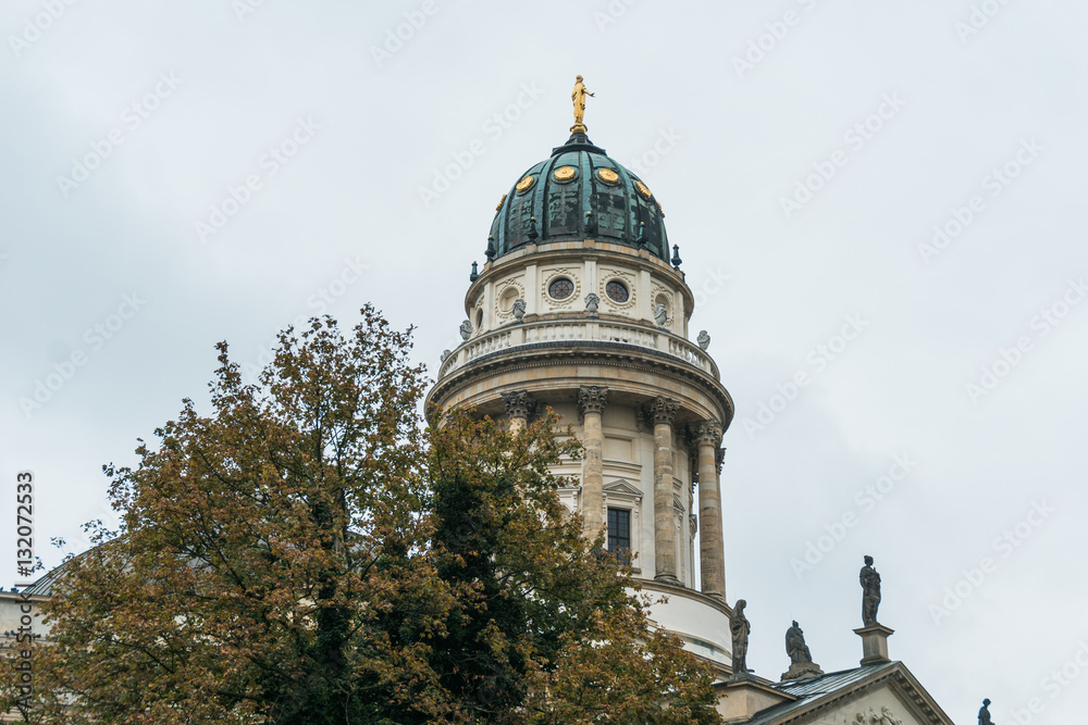 Domed cupola with colonnade and gold statue