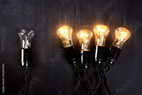 Idea Light Bulb on Blackboard photo