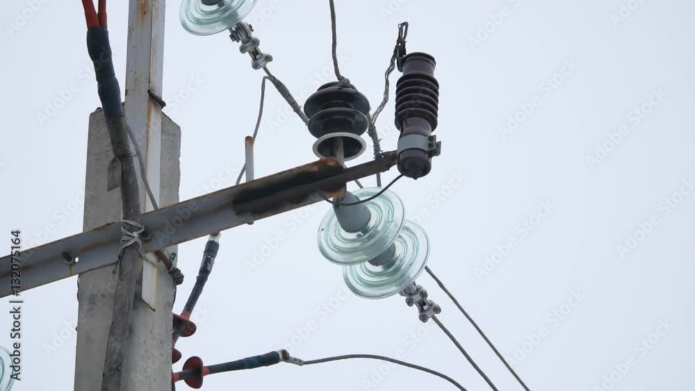 electric pole with wires on a gray sky background electric pole with wires on a gray sky background