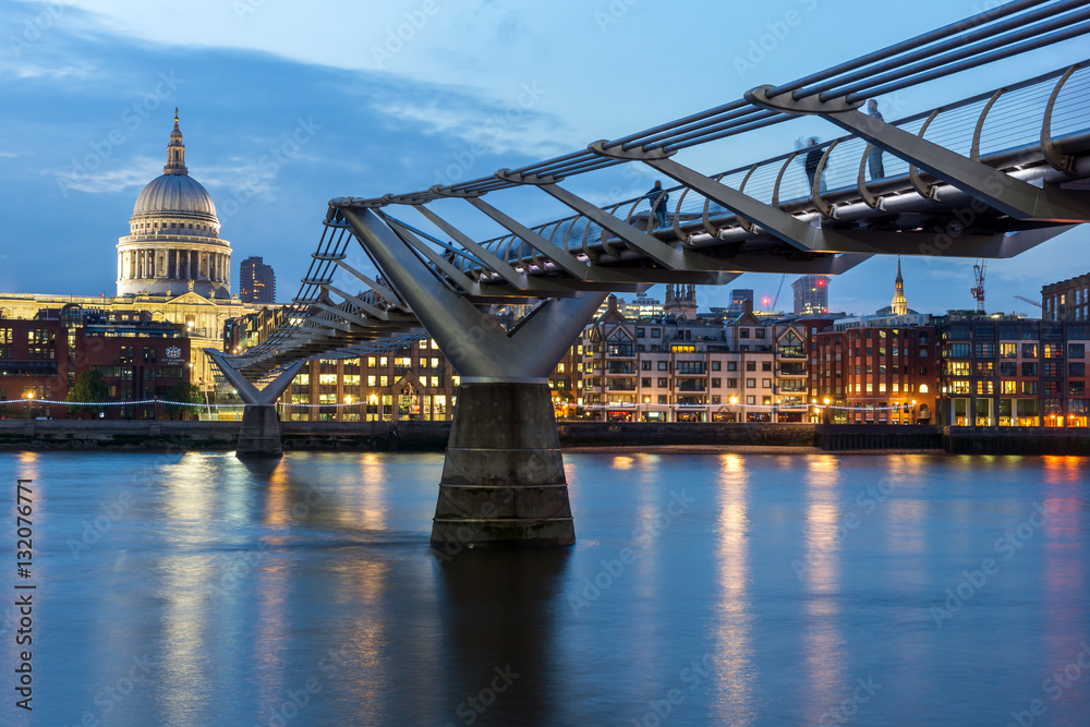 LONDON, ENGLAND - JUNE 17 2016: Night photo of Millennium Bridge and  St. Paul Cathedral, London, Great Britain