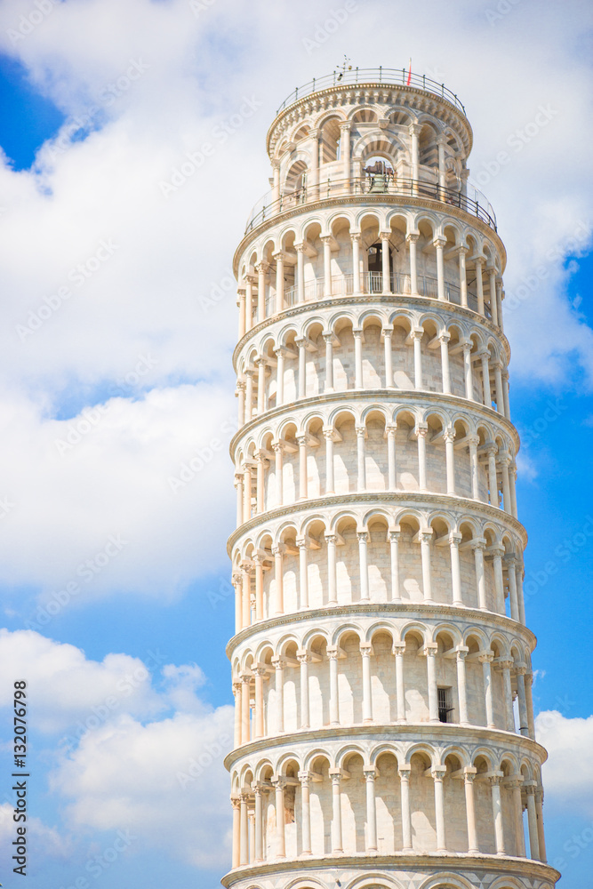 Tourists visiting the leaning tower of Pisa , Italy