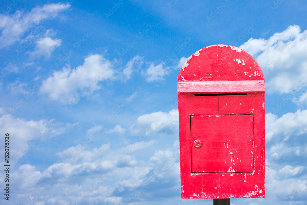 Old wood mail box and sky background Old wood mail box and sky background