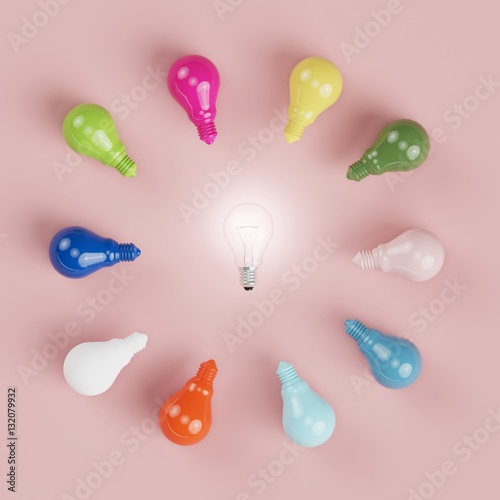 different colorful pantone pastel lightbulb with circle shape with middle lighing on. minmal concept. top view