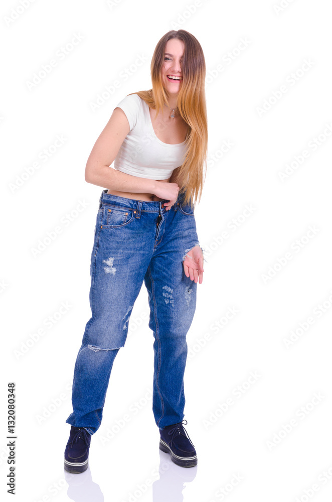 Young Girl in blue jeans large size on a white background Young Girl in blue jeans large size on a white background