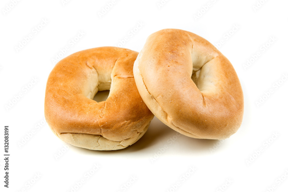Plain white bagels isolated on a white background Plain white bagels isolated on a white background