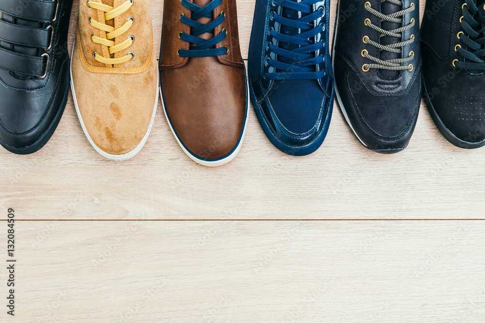 Leather shoes on wooden background Leather shoes on wooden background