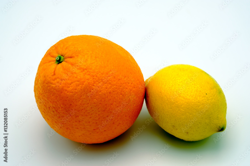 Orange and lemon fruits isolated on white background Orange and lemon fruits isolated on white background
