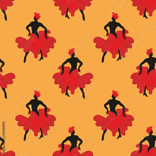 Seamless pattern with the image of the silhouette of a beautiful woman dancing flamenco.