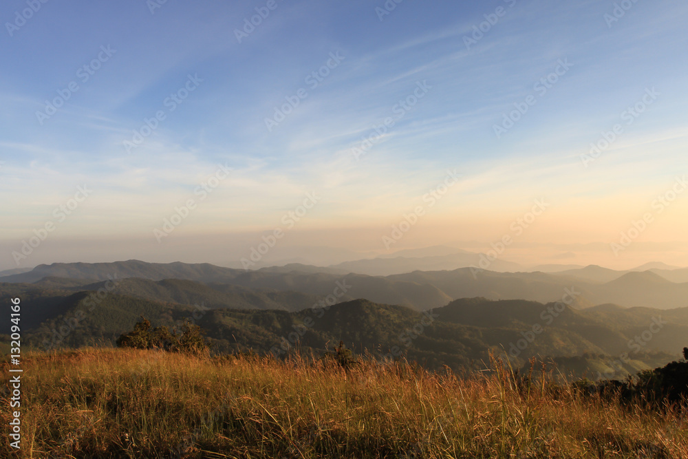 Landscape with the green grass on mountain in sunrise, Doimonjong Thailand Landscape with the green grass on mountain in sunrise, Doimonjong Thailand