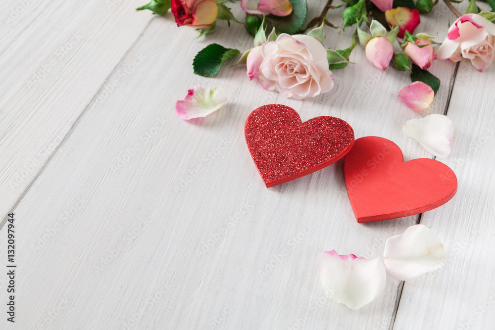 Valentine day background, hearts and flowers on white wood