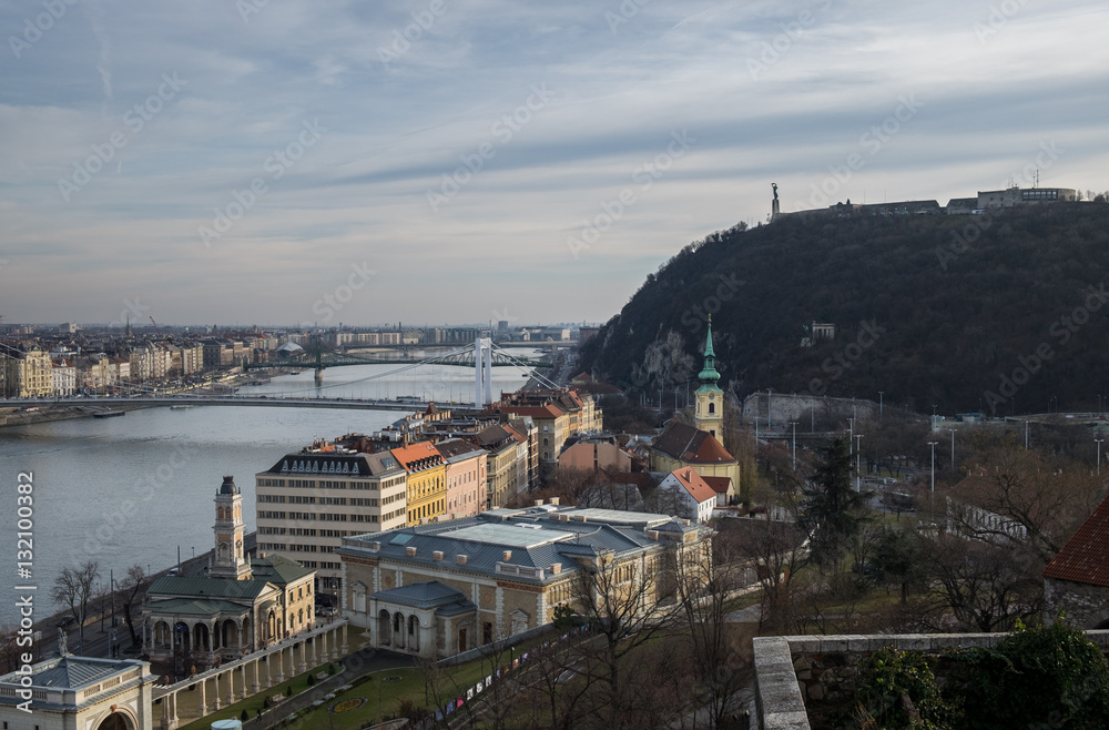 Panoramic view of Gellert Hill at cold foggy day. Budapest. Hung