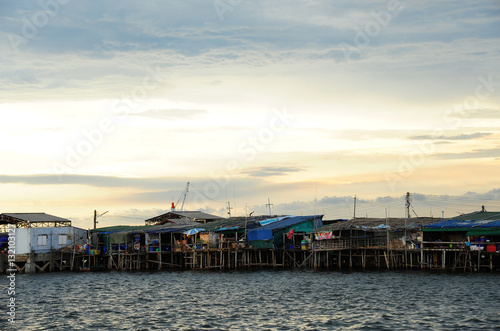 Houses construct on sea as seafood market, Thailand © nakarinz