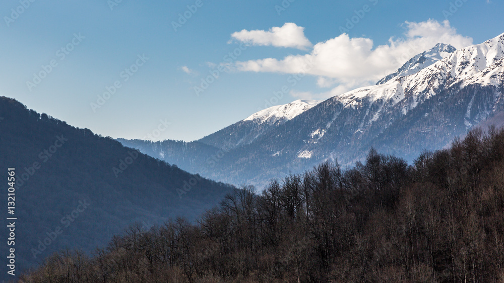 Evening view of the Caucasus mountains. Krasnaya Polyana, Sochi National Park, Russia.