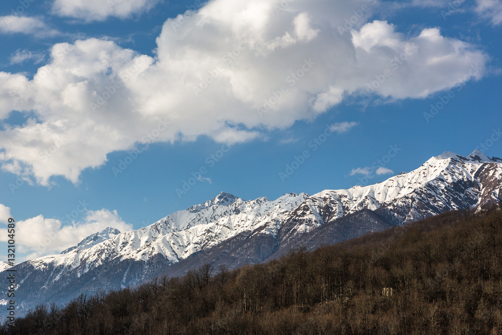 Evening view of the Caucasus mountains. Krasnaya Polyana, Sochi National Park, Russia.