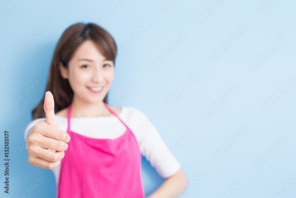 Fototapeta premium beauty housewife thumb up