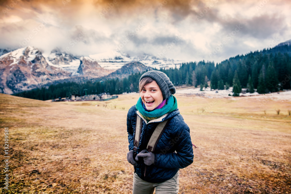 Happy traveler woman laughing with joy on the background of the Happy traveler woman laughing with joy on the background of the