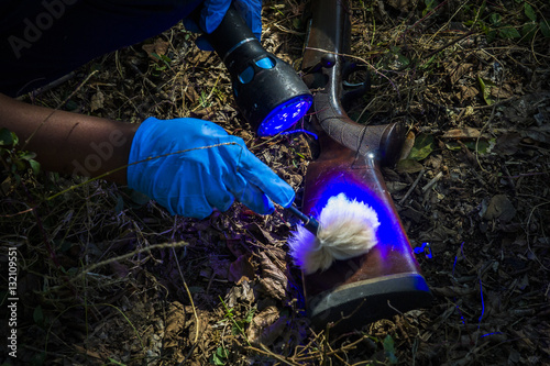 Police forensics at Hunting Rife at Rhino-poachers crime scene