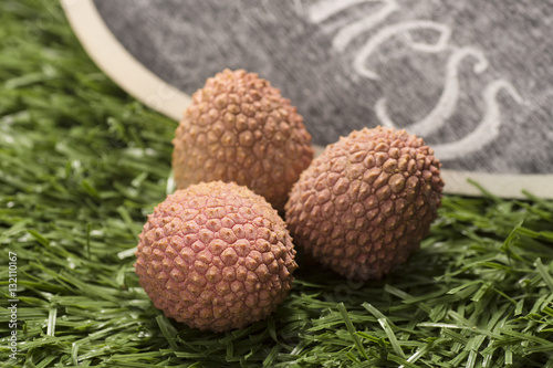 Lychees on grass background
