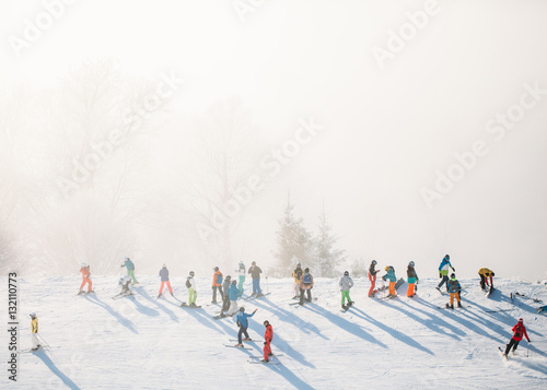 Skiing in the mountain resort with fog