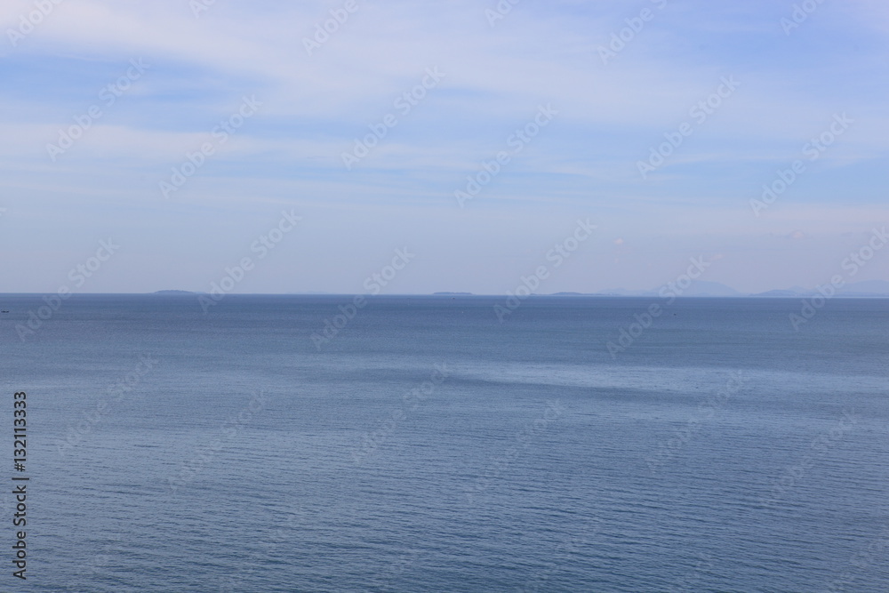 Calm Sea Ocean And Blue Sky Background