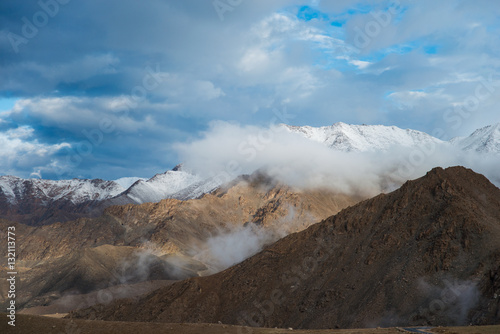 Aerial view of Le-h City, landscape with ice peaks , blue sky in background , Ladak-h, Jam-mu and Kashmir, India © pom669