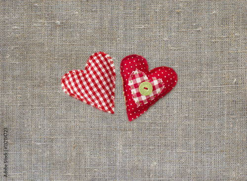 two textile hearts. Textile handicraft. Valentines Day, Wedding composition with hearts.