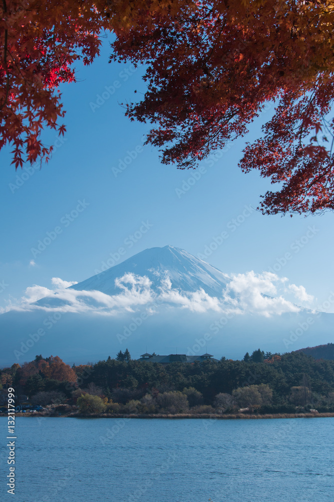 Mountain Mt. Fuji and lake in japan with blue cloud sky and red maple tree